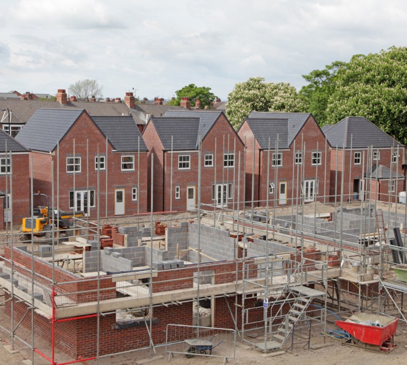 Brick homes taking shape on a residential construction site
